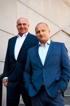 restaurant manager welcoming customers